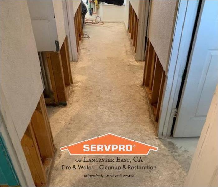 hallways drywalls cut for water damage cleanup